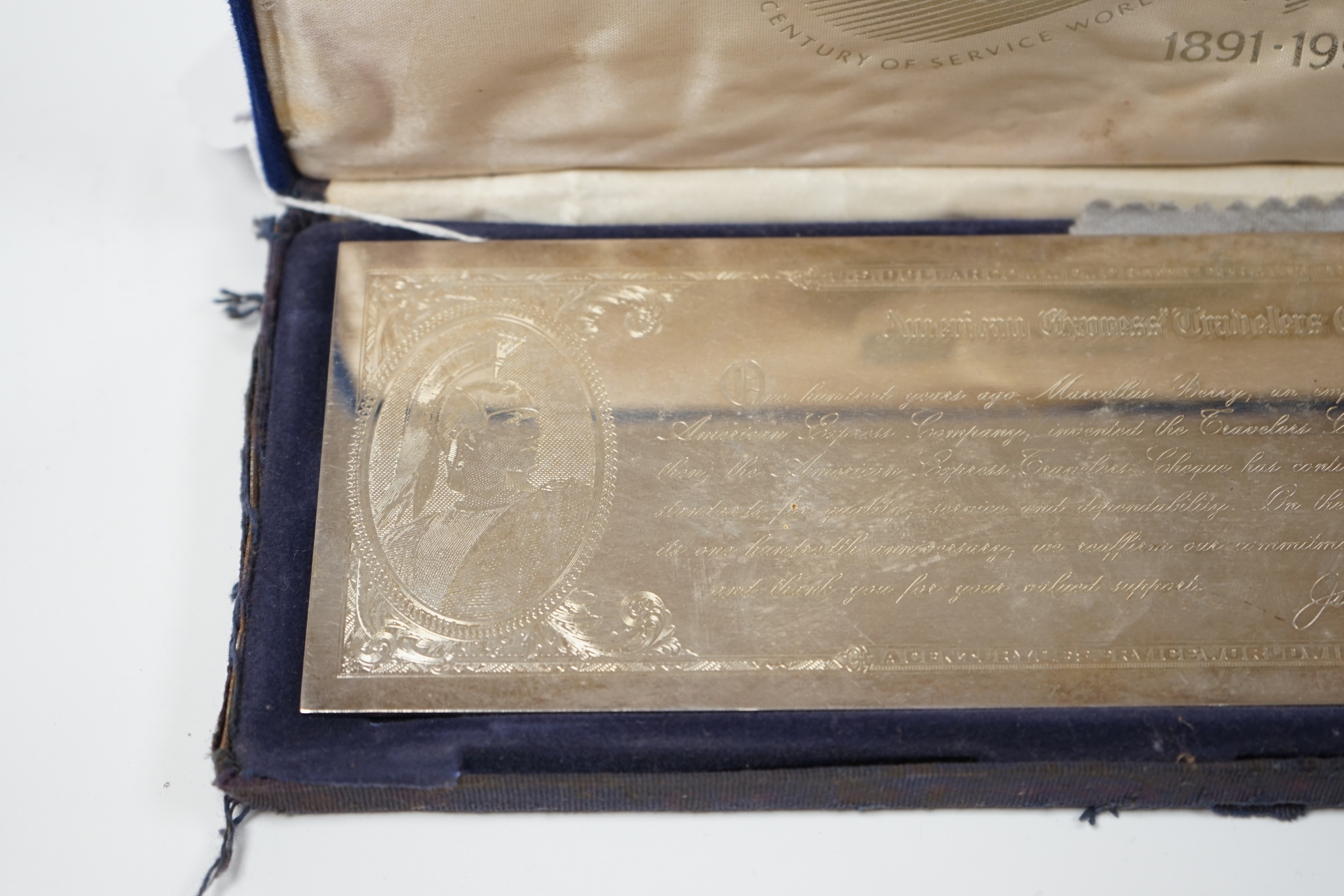 An American Express Commemorative plated Traveller's Cheque plaque